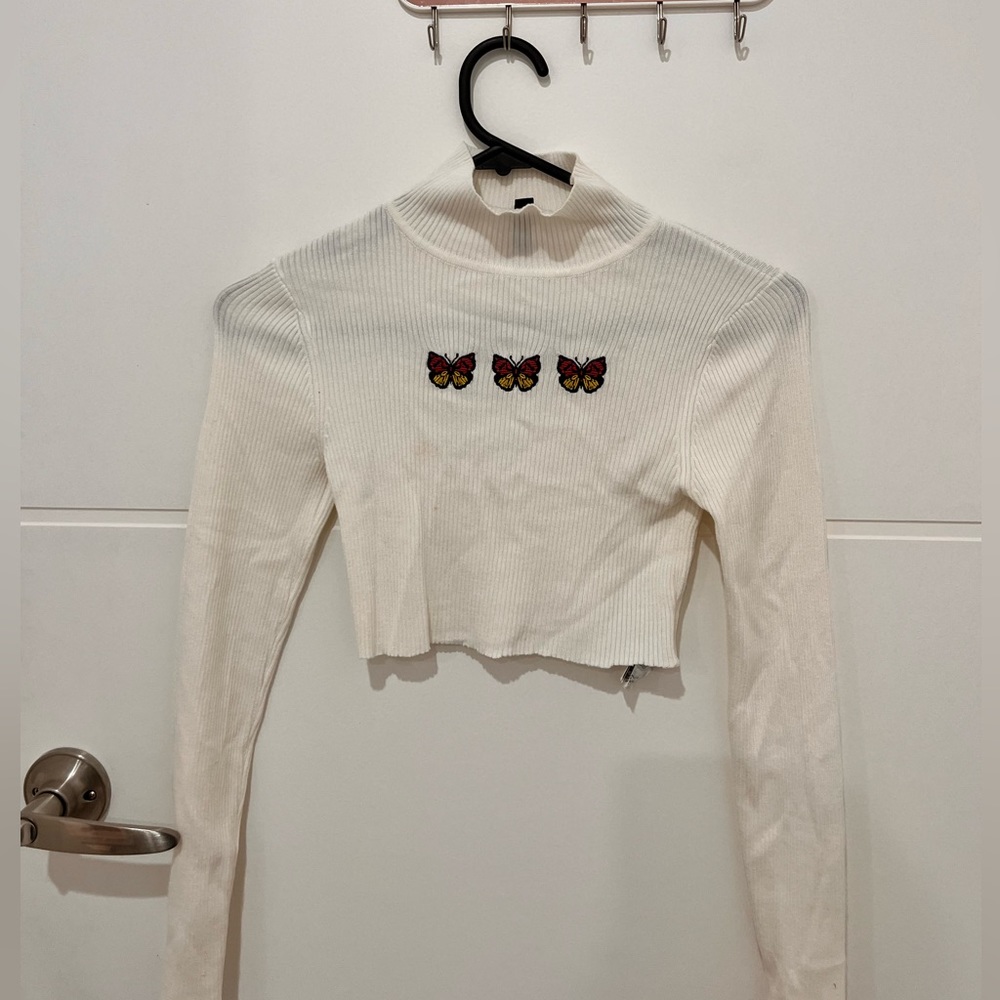 Butterfly turtle neck sweater